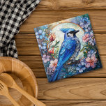 Pink Floral Blue Jay Bird Stained Glass Tile<br><div class="desc">On this ceramic tile,  a beautiful blue jay perches within a light sky circle. The circle and bird are surrounded and overlapped with pastel blue,  pink,  and orange flowers and buds. An overlay has been added to give a stained glass appearance. Pretty!</div>