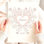 Pink Floral Heart 2025 Custom Name Planner<br><div class="desc">Embrace love and organization with this charming planner featuring a heart-shaped floral design in delicate pink hues. Personalize it with your name for a unique and heartfelt touch. This planner is perfect for keeping track of appointments, to-dos, and all your important dates throughout 2025. With its lovely design and ample...</div>