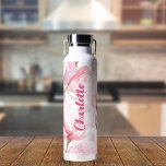 Pink florals custom name water bottle<br><div class="desc">Pink and white magnolia florals. Personalize and add your name.  White brushstroke under the name.</div>