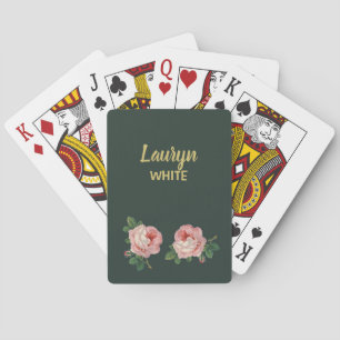Pink flower and leaves on dark green playing cards