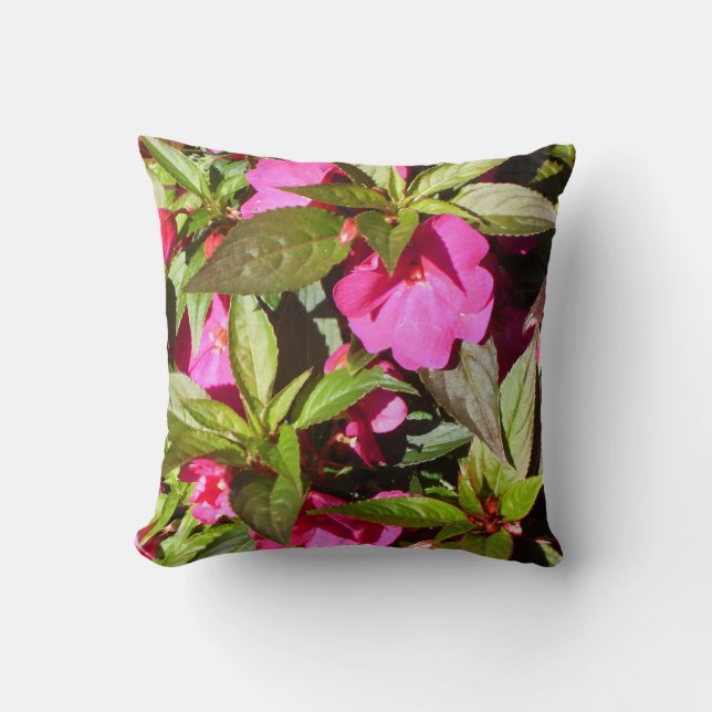 Pink flowers and green leaves throw pillow (Front)