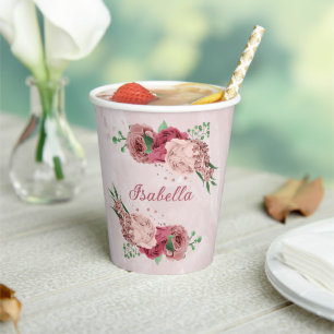 pink flowers green leaves  paper cups