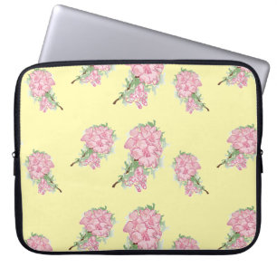 Pink flowers on yellow laptop sleeve