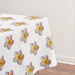 Pink Frangipani Plumeria Flowers on White Tablecloth