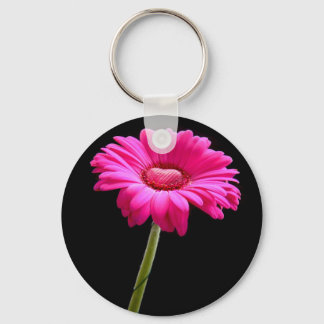 Pink gerbera with heart on black background keychain