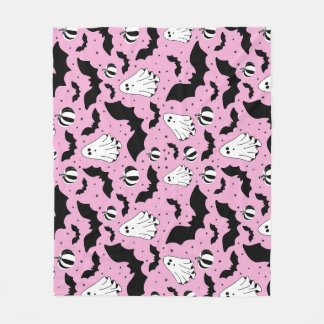 Pink ghosts, bats and pumpkins fleece blanket