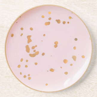 Pink glass coaster with golden spots
