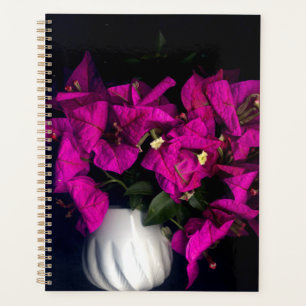 Pink heart in black planner