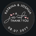 Pink Hearts A Sweet Thank You Wedding Favour Classic Round Sticker<br><div class="desc">Wedding favour stickers in black with a white typography design and pink hearts. Cute wedding favour stickers for treats and sweets with A Sweet Thank You in a beautiful typography design. Black wedding favour stickers with white text and small pink hearts. Wedding treat favour stickers in white, black, and pink....</div>