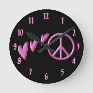 Pink hearts and peace sign wall clock. round clock
