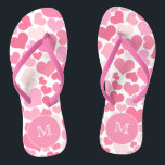 Pink Hearts Monogram Flip Flops<br><div class="desc">NewParkLane - Get ready for summer with these fun romantic monogrammed flip flops, with a pattern of hearts in different shades of pink, with a hot pink frame for your monogram. Add a vibrant & dramatic splash to your destination wedding! Easy to customize in Zazzle with your own text for...</div>