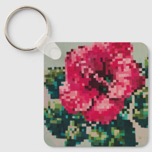 Pink hibiscus flower in pixel art keychain