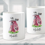 Pink Initial Name Monogram Coffee Mug<br><div class="desc">This cute ceramic mug features a stylish pink watercolor golf bag filled with clubs, sitting on a patch of green grass. The design appears on both sides of the mug for easy viewing from any angle. A simple serif initial monogram is placed directly on the bag, seamlessly blending into the...</div>
