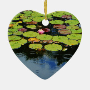 Pink lotus in Rain Ceramic Ornament