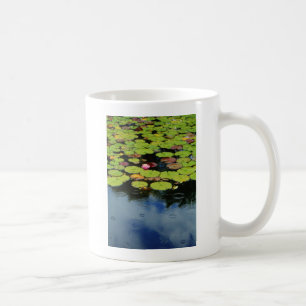 Pink lotus in Rain Coffee Mug
