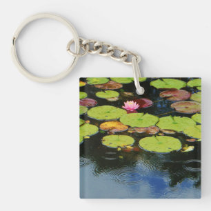 Pink lotus in Rain Keychain