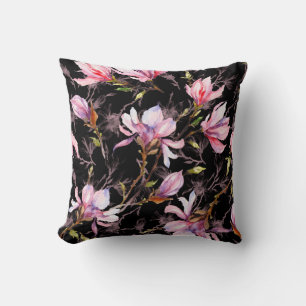 Pink magnolia flowers on a twig pattern throw pillow