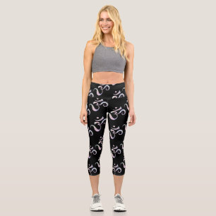 Pink Marbled Om Scattered Black Background Capri Leggings