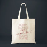 Pink Monogram Name Script Hobby Sports Tote Bag<br><div class="desc">Personalized Pink and Rose Gold Custom Monogram Name Tote Bag with editable text typography and wording with a list of her hobby interests and sports played makes a fun and useful gift for the girl on the go and in lots of extracurricular activities. This example reads "hockey, lacrosse, hiking, reading,...</div>