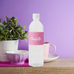 Pink name script water bottle label<br><div class="desc">A trendy and girly pink coloured background. Personalize and add your name written with a modern hand lettered style script in white.</div>