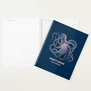 Pink octopus on dark blue planner