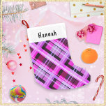 Pink Plaid Winter Patterned Chic Personalized Name Small Christmas Stocking<br><div class="desc">A bright and festive Christmas stocking, in an attractive pink plaid design. Personalize the stocking with the recipient's name, which will appear in black lettering on the white panel at the top. Combining rustic tradition with modern style, the stocking is ideal for Santa to fill with suitable surprises, as well...</div>
