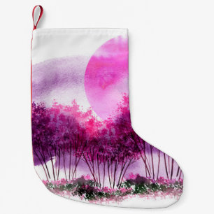 pink, purple silhouette of trees against the backg small christmas stocking