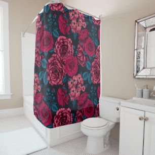 Pink, red and bi-colour roses with blue leaves on