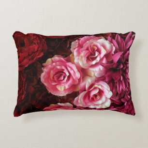 Pink, red roses: fabric background. accent pillow