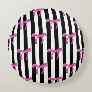 Pink ribbon bows on black and white stripes round pillow