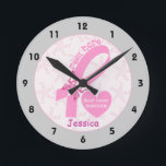 Pink Ribbon Breast cancer survivor, grey border Round Clock<br><div class="desc">Pink Ribbon Breast cancer survivor with grey border custom clock. A feminine, personalized design featuring the Pink Ribbon with a pink white butterfly, the phrase PINK HOPE in a font with hearts and a heart with the text Breast cancer survivor. There is a pattern with pink ribbons with a grey...</div>