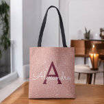 Pink Rose Gold Burgundy Sparkle Elegant Monogram Tote Bag<br><div class="desc">Blush Pink - Rose Gold and Burgundy Faux Sparkle and Glitter Elegant Monogram Book Bag. This Book Bag can be customized to include your initial and first name.</div>