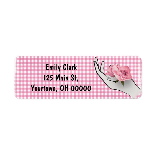 pink rose in hand on gingham (Front)