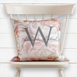 Pink Rose Peony Script Monogram Wedding Keepsake Throw Pillow<br><div class="desc">Personalized wedding keepsake. This beautiful, elegant design pillow features a luminous pink rose and peony bouquet over a pink, coral and blue watercolor background. The classic grey monogram initial sits in a transluscent layer featuring an inner border of faux gold foil. The couple's first names are written over the monogram...</div>