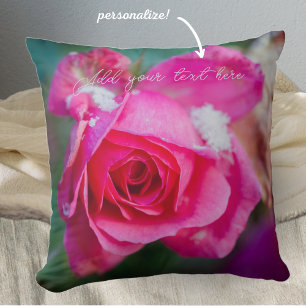 Pink rose with snowflakes throw pillow