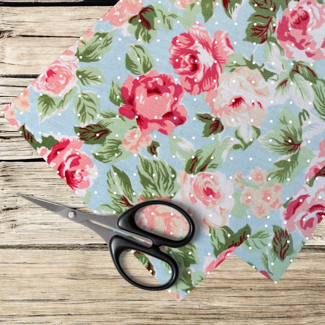 pink roses and white polka dots on light blue tissue paper (Creator Uploaded)