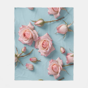 Pink Roses Scattered Across Light Blue Background Fleece Blanket
