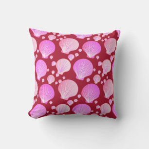 Pink seashells on a burgundy background throw pillow