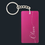 Pink Shimmer White Elegant Calligraphy Script Name Keychain<br><div class="desc">Pink Shimmer White Elegant Calligraphy Script Custom Personalized Name iPhone 14 Smart Phone Cases features a modern and trendy simple and stylish design with your personalized name in elegant hand written calligraphy script typography on a metallic pink shimmer background. Designed by ©Evco Studio www.zazzle.com/store/evcostudio</div>