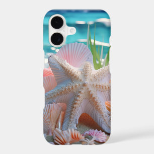 PINK STARFISH & SEASHELLS ON SANDY BEACH