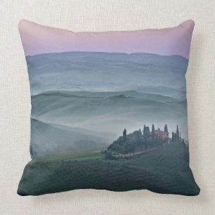 Pink sunrise over a Tuscany landscape pillow