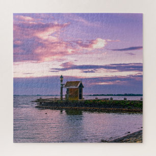 Pink sunset over lake jigsaw puzzle