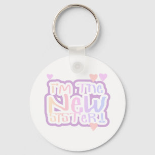 Pink Text I'm the New Sister Keychain