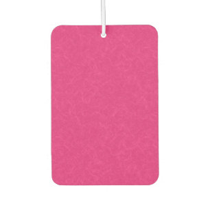 Pink textured surface with subtle swirling pattern air freshener
