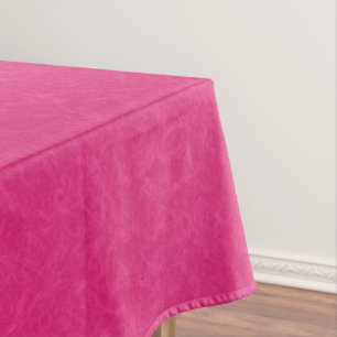 Pink textured surface with subtle swirling pattern tablecloth