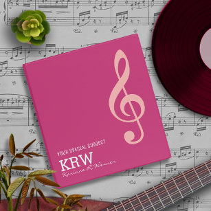 pink treble clef musical note on magenta binder
