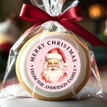 Pink Vintage Retro Santa Claus Merry Christmas Classic Round Sticker<br><div class="desc">Celebrate the festive season with our Pink Vintage Retro Santa Claus Merry Christmas Classic Round Sticker! This charming sticker features a nostalgic Santa Claus design set against a stylish solid background, combining vintage charm with modern flair. Perfect for adding a festive touch to your Christmas Gifts and Holiday packaging. Personalize...</div>