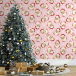 Pink Vintage Santa Claus Christmas Wallpaper<br><div class="desc">Bring the magic of the holidays into your home with this pink vintage Santa Claus Christmas wallpaper. Featuring charming illustrations of Santa's cheerful face and delicate snowflakes against a pink background, this design adds a festive and nostalgic touch to any room. Perfect for creating a cozy and merry atmosphere, this...</div>