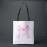 Pink Watercolor Bow Girly Monogram Tote Bag<br><div class="desc">This design features a cute watercolor pink bow with space for a monogram letter. Click the customize button for more flexibility in modifying the text or moving the graphics! Variations of this design as well as coordinating products are available in our shop, zazzle.com/store/doodlelulu. Contact us if you need this design...</div>
