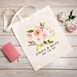 Pink Watercolor Flowers Bouquet Wedding Monogram Tote Bag<br><div class="desc">Personalized tote bag design features a monogram of the bride & groom names and wedding date with a beautiful watercolor painted floral bouquet design with pastel pink, blush, and peach spring dahlia and rose flowers paired with vibrant green foliage.</div>